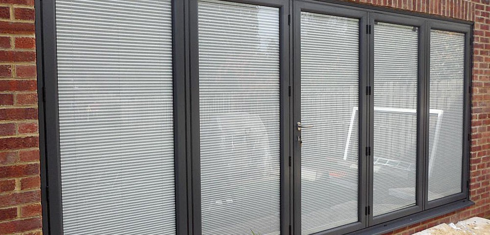 integral blinds viewed in a four pane bi-fold door