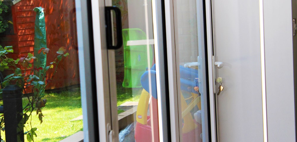 White queniborogh bi-fold door viewed close up from inside