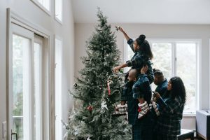 family decorating tree